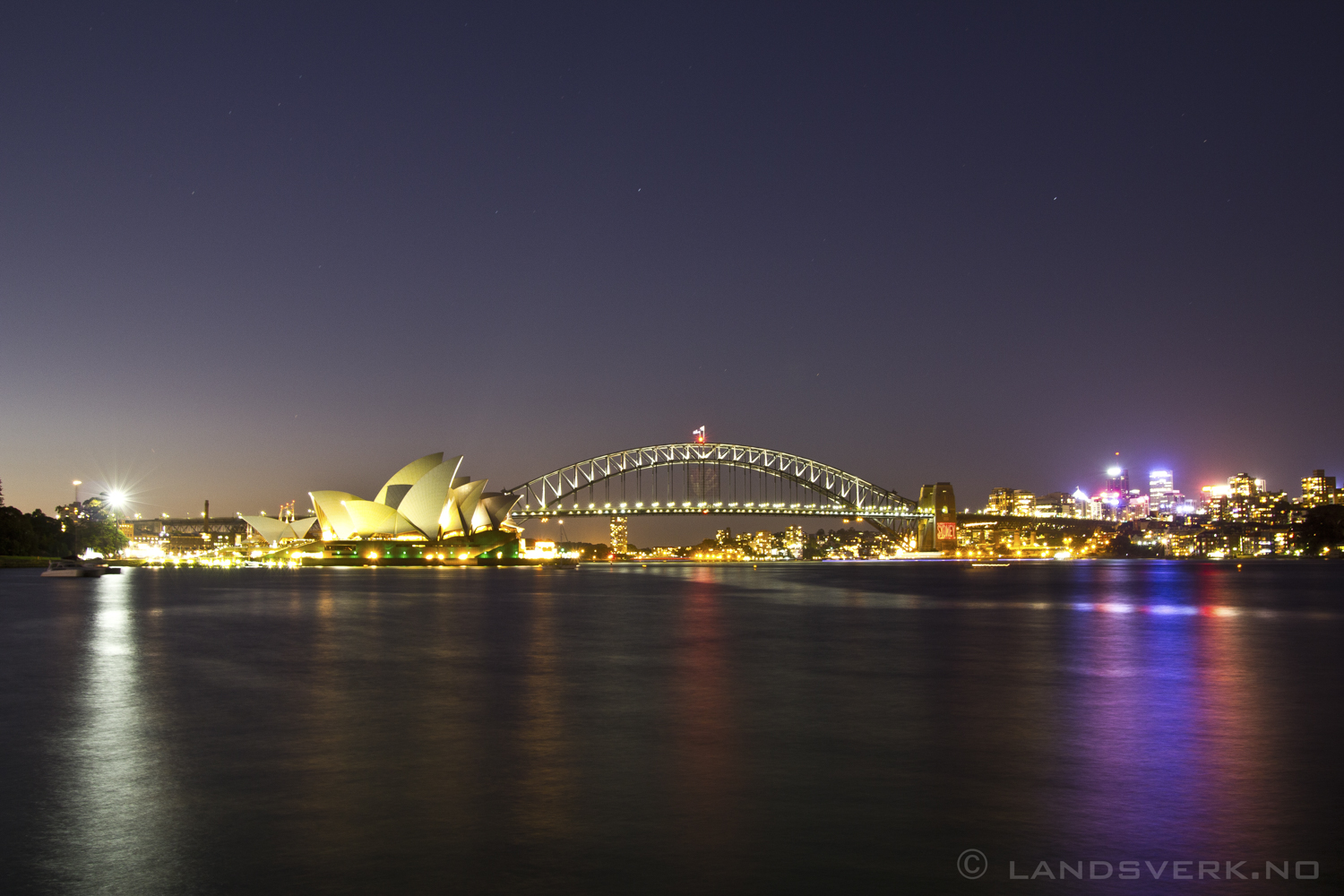 Sydney Harbor at night, New South Wales. 

(Canon EOS 550D / Sigma 18-50mm F2.8)