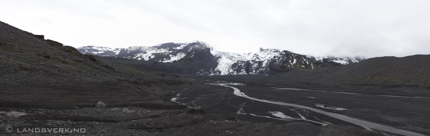 Eyjafjallajökull, with one of it's glacier tongues stretching out. Before the eruption in 2010 this whole area was a gigantig glacier lagoon 30-40 meters deep, now it's been filled with gravel and ash as a result from lots of melted ice caused by the eruption of the volcano under Eyjafjallajökull. The whole process took 6 hours.

(Canon EOS 5D Mark II / Canon EF 24-70mm f/2.8 L USM)