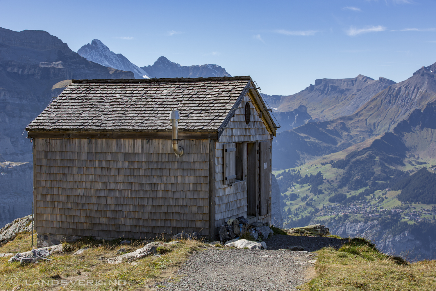 Hiking from Kleine Scheidegg to Wengen with Mürren in the background, Switzerland. 

(Canon EOS 5D Mark III / Canon EF 70-200mm f/2.8 L IS II USM)